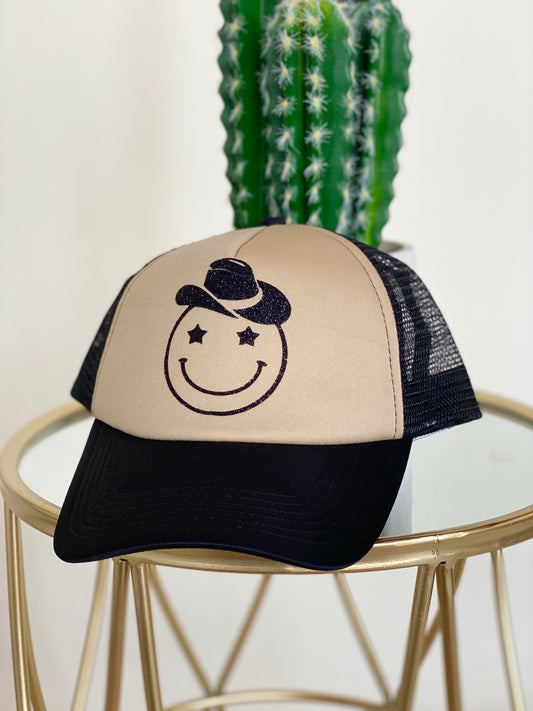 Howdy Smiley Glitter Trucker Hat - Black and Tan