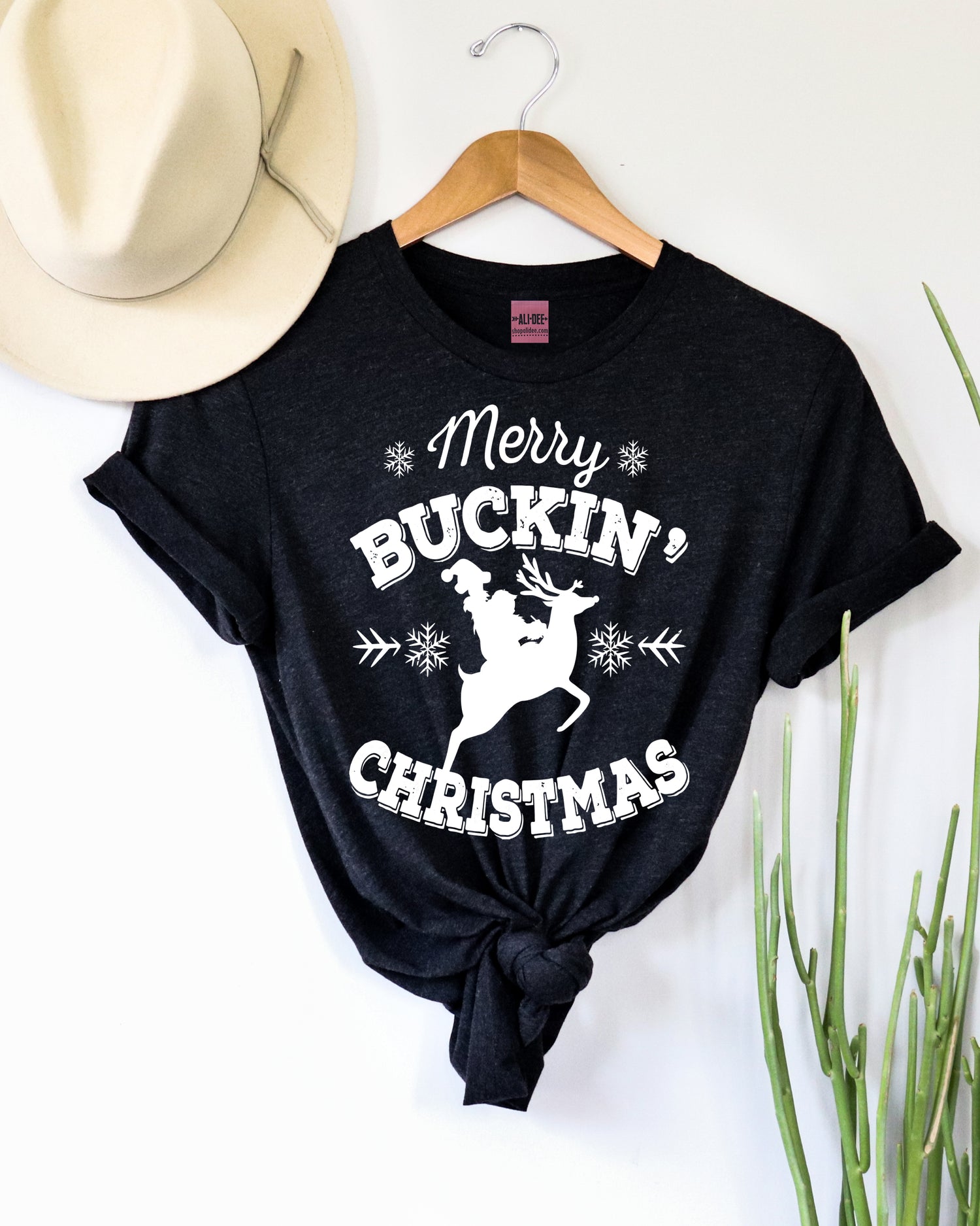 Merry Buckin Christmas Western – Graphic Dee Ali Tee - Black Wholesale Heather